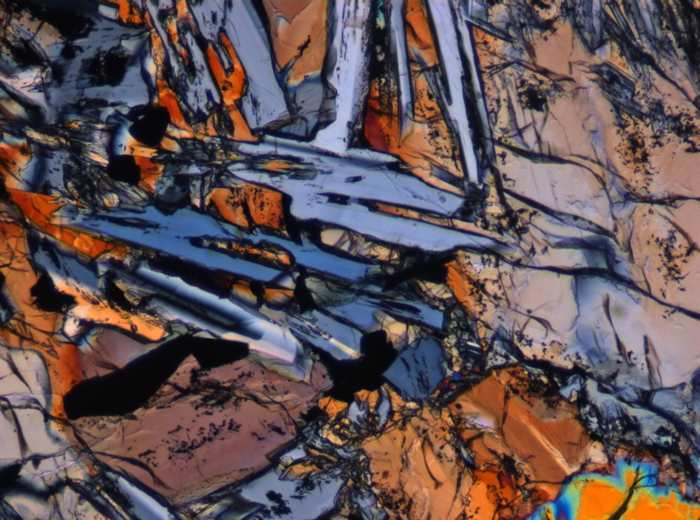 Thin Section Photograph of Apollo 12 Sample 12075,80 in Cross-Polarized Light at 10x Magnification and 0.7 mm Field of View (View #4)