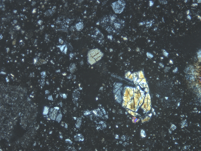 Thin Section Photograph of Apollo 14 Sample 14047,50 in Cross-Polarized Light at 10x Magnification and 1.15 mm Field of View (View #4)