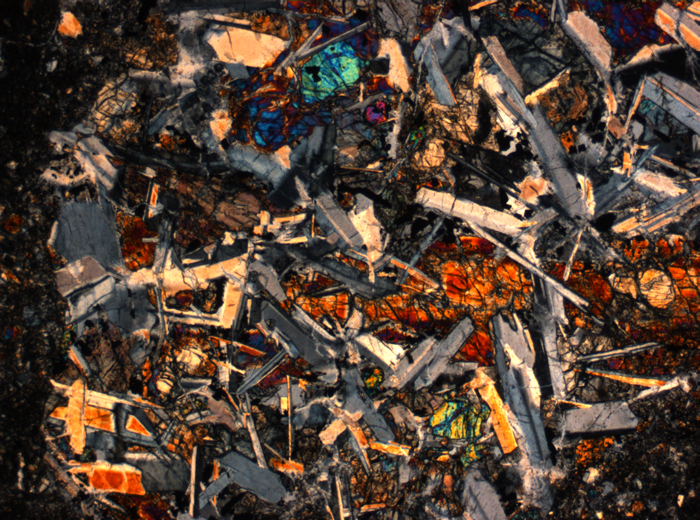 Thin Section Photograph of Apollo 14 Sample 14305,14 in Cross-Polarized Light at 2.5x Magnification and 2.85 mm Field of View (View #57)