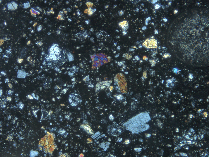 Thin Section Photograph of Apollo 14 Sample 14307,9 in Cross-Polarized Light at 10x Magnification and 1.15 mm Field of View (View #2)
