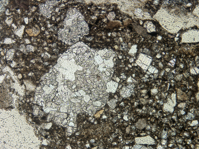 Thin Section Photograph of Apollo 14 Sample 14307,9 in Plane-Polarized Light at 10x Magnification and 1.15 mm Field of View (View #3)