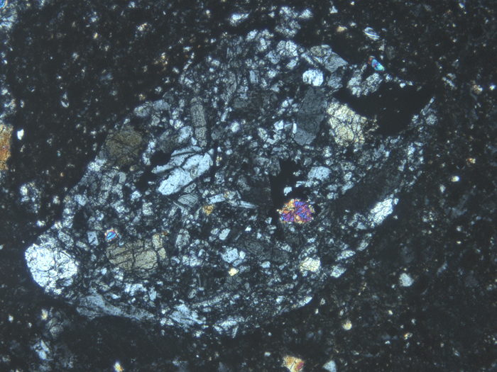 Thin Section Photograph of Apollo 14 Sample 14307,9 in Cross-Polarized Light at 10x Magnification and 1.15 mm Field of View (View #5)
