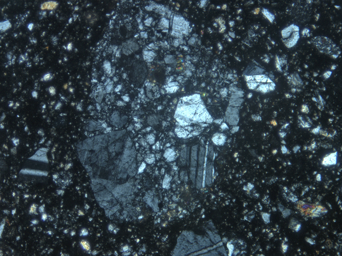 Thin Section Photograph of Apollo 14 Sample 14313,40 in Cross-Polarized Light at 10x Magnification and 1.15 mm Field of View (View #5)