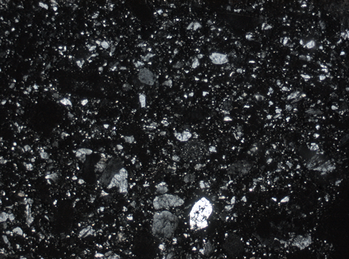 Thin Section Photograph of Apollo 15 Sample 15027,7 in Cross-Polarized Light at 2.5x Magnification and 2.85 mm Field of View (View #1)
