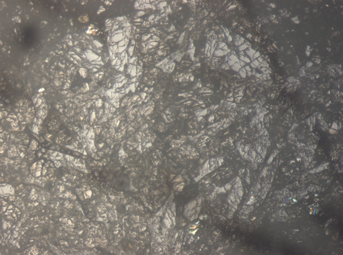 Thin Section Photograph of Apollo 15 Sample 15059,44 in Reflected Light at 5x Magnification and 1.4 mm Field of View (View #2)