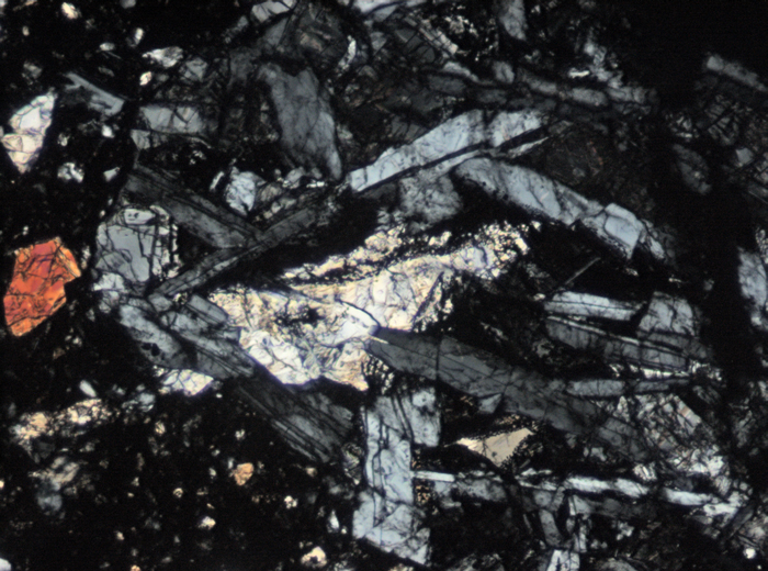 Thin Section Photograph of Apollo 15 Sample 15059,44 in Cross-Polarized Light at 10x Magnification and 0.7 mm Field of View (View #6)