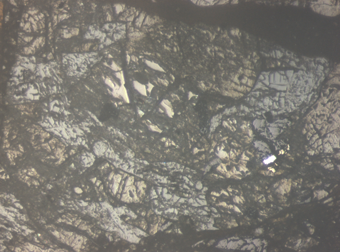 Thin Section Photograph of Apollo 15 Sample 15059,44 in Reflected Light at 10x Magnification and 0.7 mm Field of View (View #7)