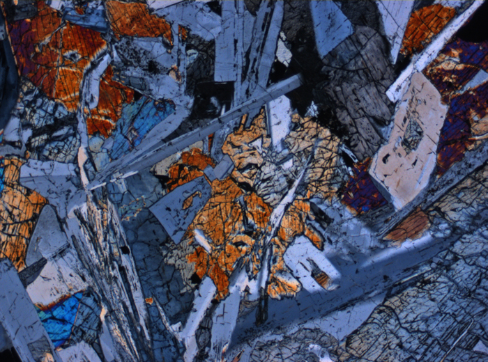 Thin Section Photograph of Apollo 15 Sample 15076,66 in Cross-Polarized Light at 2.5x Magnification and 2.85 mm Field of View (View #1)