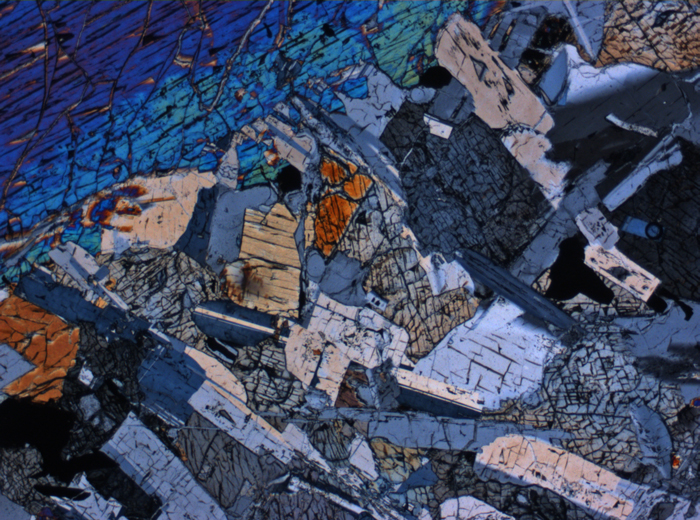 Thin Section Photograph of Apollo 15 Sample 15076,66 in Cross-Polarized Light at 2.5x Magnification and 2.85 mm Field of View (View #3)