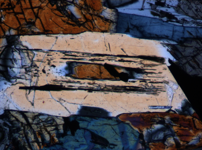 Thin Section Photograph of Apollo 15 Sample 15076,66 in Cross-Polarized Light at 10x Magnification and 0.7 mm Field of View (View #4)