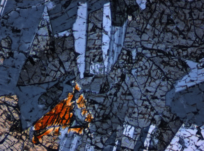 Thin Section Photograph of Apollo 15 Sample 15076,66 in Cross-Polarized Light at 10x Magnification and 0.7 mm Field of View (View #6)