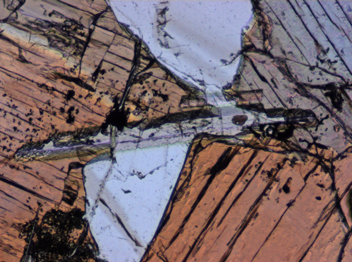 Thin Section Photograph of Apollo 15 Sample 15085,11 in Plane-Polarized Light at 10x Magnification and 0.7 mm Field of View (View #4)