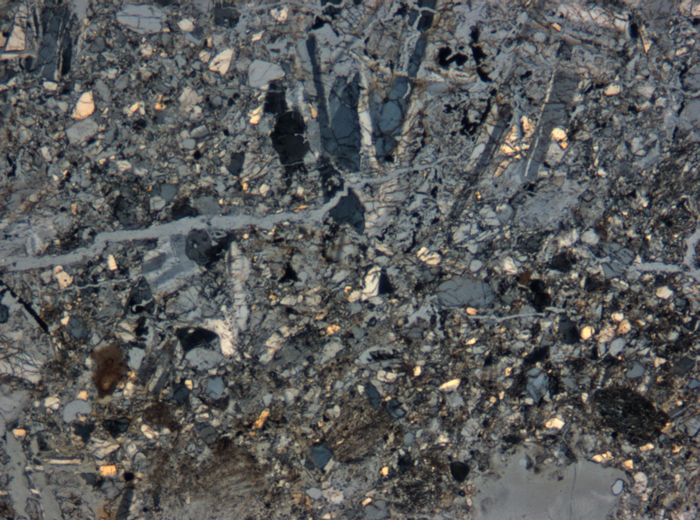 Thin Section Photograph of Apollo 15 Sample 15095,4 in Cross-Polarized Light at 5x Magnification and 1.4 mm Field of View (View #1)
