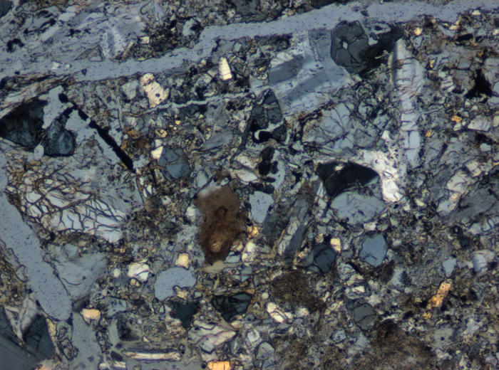 Thin Section Photograph of Apollo 15 Sample 15095,4 in Cross-Polarized Light at 10x Magnification and 0.7 mm Field of View (View #2)
