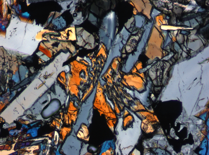 Thin Section Photograph of Apollo 15 Sample 15118,18 in Cross-Polarized Light at 10x Magnification and 0.7 mm Field of View (View #5)