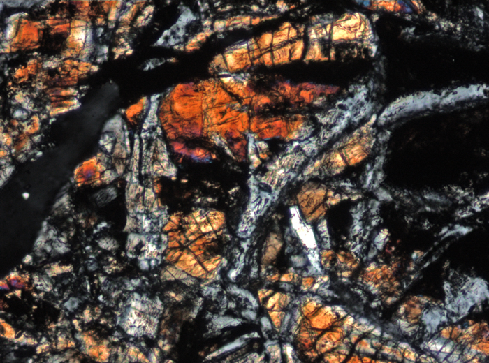 Thin Section Photograph of Apollo 15 Sample 15206,31 in Cross-Polarized Light at 10x Magnification and 0.7 mm Field of View (View #4)