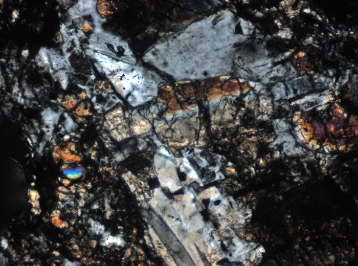 Thin Section Photograph of Apollo 15 Sample 15206,31 in Cross-Polarized Light at 10x Magnification and 0.7 mm Field of View (View #5)