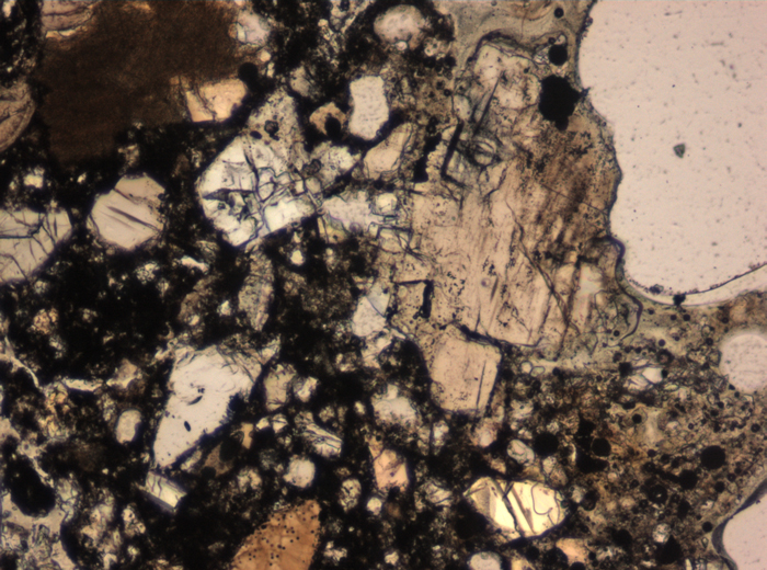 Thin Section Photograph of Apollo 15 Sample 15255,38 in Plane-Polarized Light at 10x Magnification and 0.7 mm Field of View (View #5)