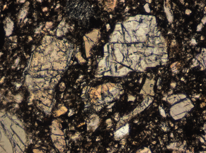 Thin Section Photograph of Apollo 15 Sample 15257,4 in Plane-Polarized Light at 10x Magnification and 0.7 mm Field of View (View #5)