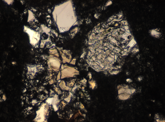 Thin Section Photograph of Apollo 15 Sample 15405,147 in Plane-Polarized Light at 10x Magnification and 0.7 mm Field of View (View #4)
