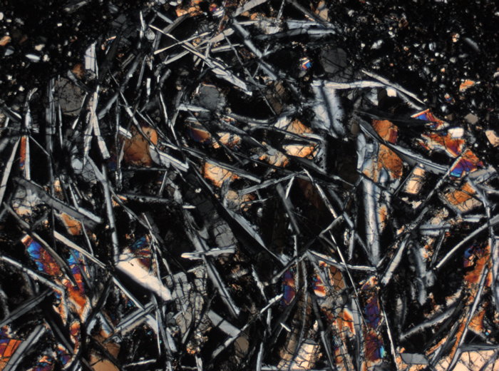 Thin Section Photograph of Apollo 15 Sample 15465,94 in Cross-Polarized Light at 2.5x Magnification and 2.85 mm Field of View (View #2)