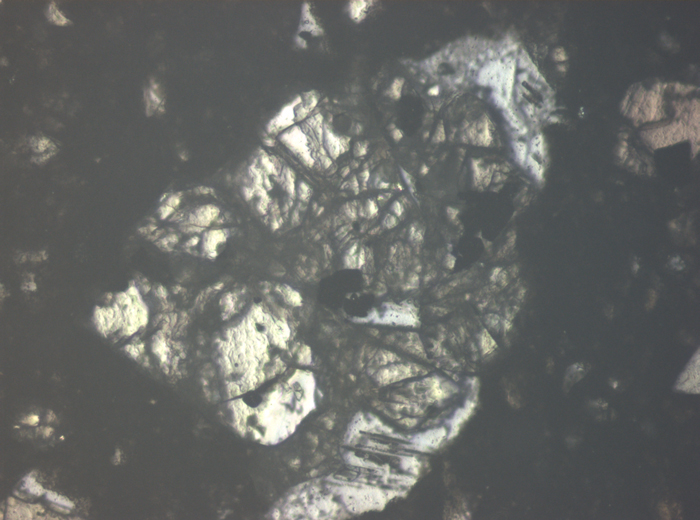 Thin Section Photograph of Apollo 15 Sample 15558,17 in Reflected Light at 10x Magnification and 0.7 mm Field of View (View #4)