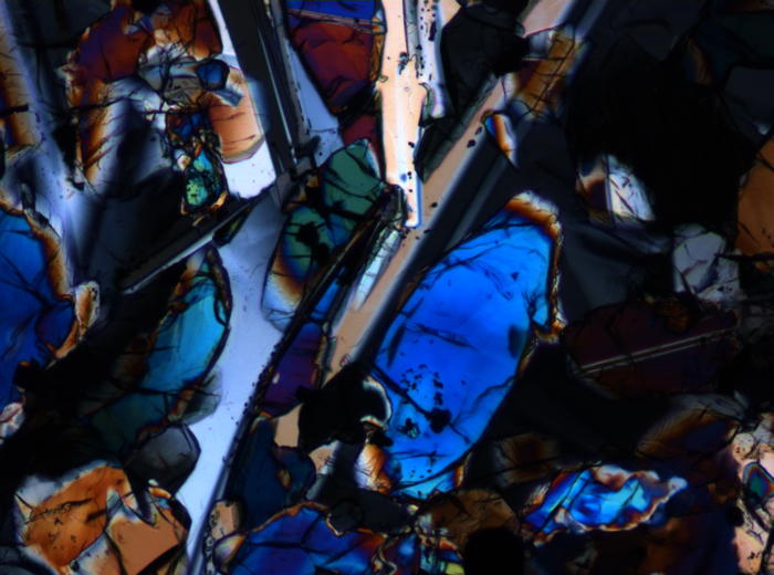 Thin Section Photograph of Apollo 15 Sample 15647,7 in Cross-Polarized Light at 10x Magnification and 0.7 mm Field of View (View #4)