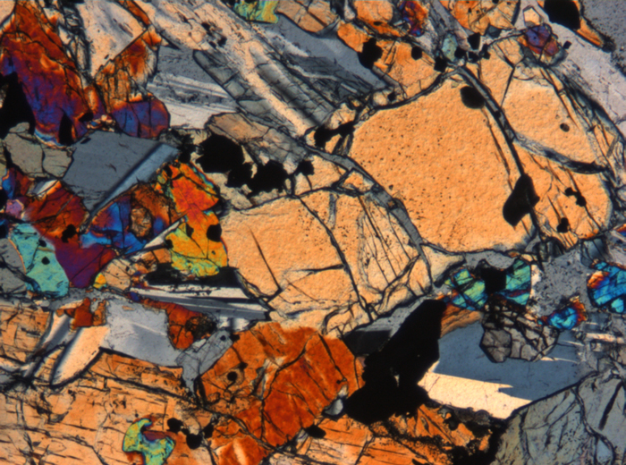 Thin Section Photograph of Apollo 15 Sample 15663,11 in Cross-Polarized Light at 5x Magnification and 1.4 mm Field of View (View #5)