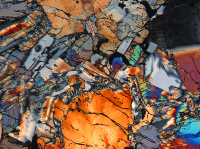 Thin Section Photograph of Apollo 15 Sample 15672,13 in Cross-Polarized Light at 5x Magnification and 1.4 mm Field of View (View #4)