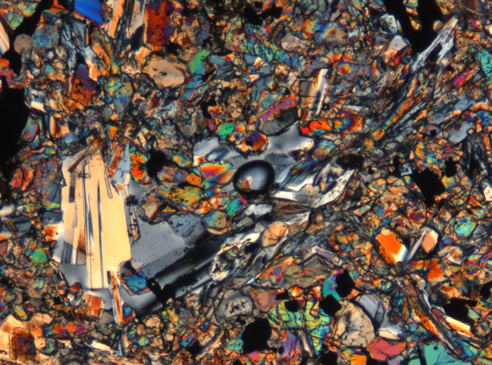 Thin Section Photograph of Apollo 15 Sample 15676,14 in Cross-Polarized Light at 5x Magnification and 1.4 mm Field of View (View #2)