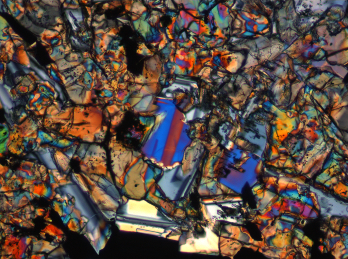 Thin Section Photograph of Apollo 15 Sample 15676,14 in Cross-Polarized Light at 10x Magnification and 0.7 mm Field of View (View #5)