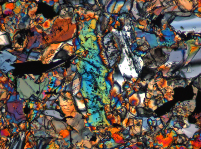 Thin Section Photograph of Apollo 15 Sample 15676,14 in Cross-Polarized Light at 10x Magnification and 0.7 mm Field of View (View #6)
