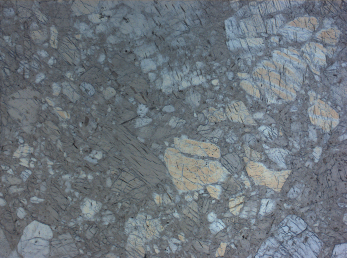 Thin Section Photograph of Apollo 16 Sample 60025,269 in Plane-Polarized Light at 10x Magnification and 0.7 mm Field of View (View #2)