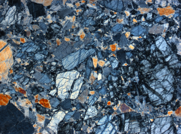 Thin Section Photograph of Apollo 16 Sample 60025,269 in Cross-Polarized Light at 10x Magnification and 0.7 mm Field of View (View #22)