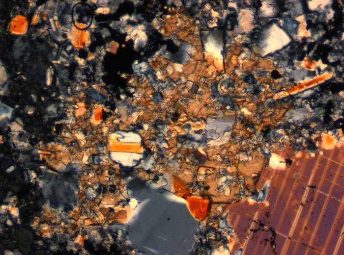 Thin Section Photograph of Apollo 16 Sample 65015,164 in Cross-Polarized Light at 2.5x Magnification and 2.85 mm Field of View (View #6)