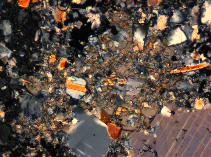 Thin Section Photograph of Apollo 16 Sample 65015,164 in Cross-Polarized Light at 2.5x Magnification and 2.85 mm Field of View (View #8)