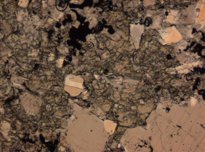 Thin Section Photograph of Apollo 16 Sample 65015,164 in Plane-Polarized Light at 2.5x Magnification and 2.85 mm Field of View (View #8)