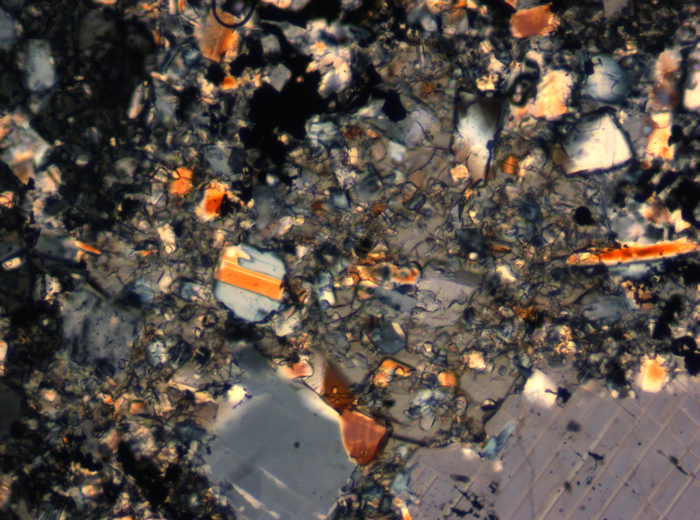 Thin Section Photograph of Apollo 16 Sample 65015,164 in Cross-Polarized Light at 2.5x Magnification and 2.85 mm Field of View (View #9)