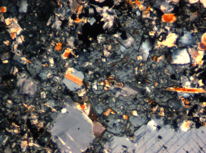 Thin Section Photograph of Apollo 16 Sample 65015,164 in Cross-Polarized Light at 2.5x Magnification and 2.85 mm Field of View (View #11)