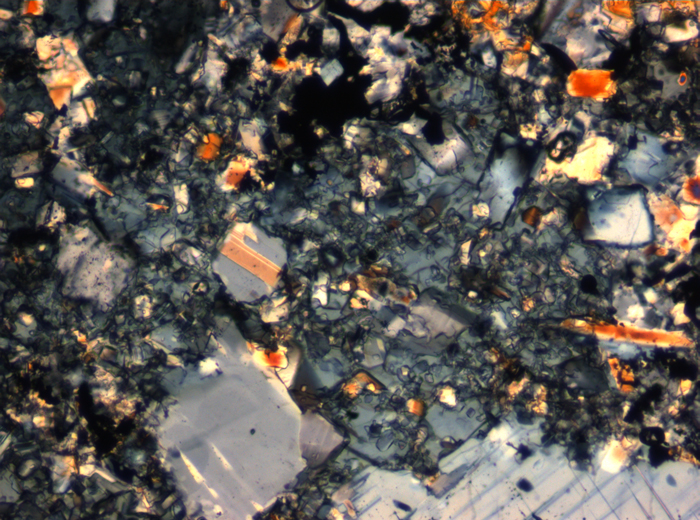 Thin Section Photograph of Apollo 16 Sample 65015,164 in Cross-Polarized Light at 2.5x Magnification and 2.85 mm Field of View (View #12)