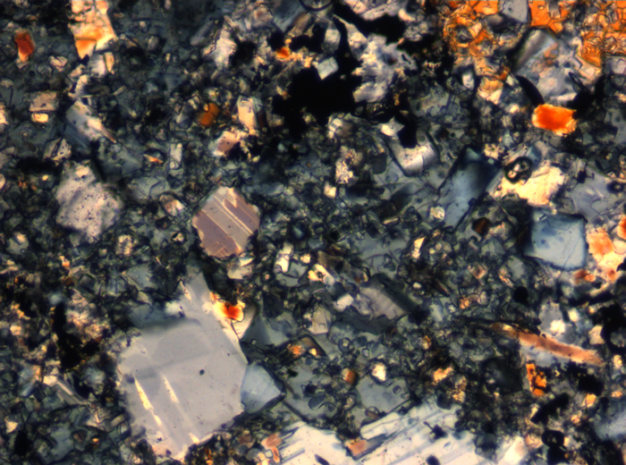 Thin Section Photograph of Apollo 16 Sample 65015,164 in Cross-Polarized Light at 2.5x Magnification and 2.85 mm Field of View (View #14)