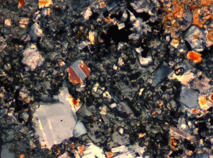 Thin Section Photograph of Apollo 16 Sample 65015,164 in Cross-Polarized Light at 2.5x Magnification and 2.85 mm Field of View (View #16)