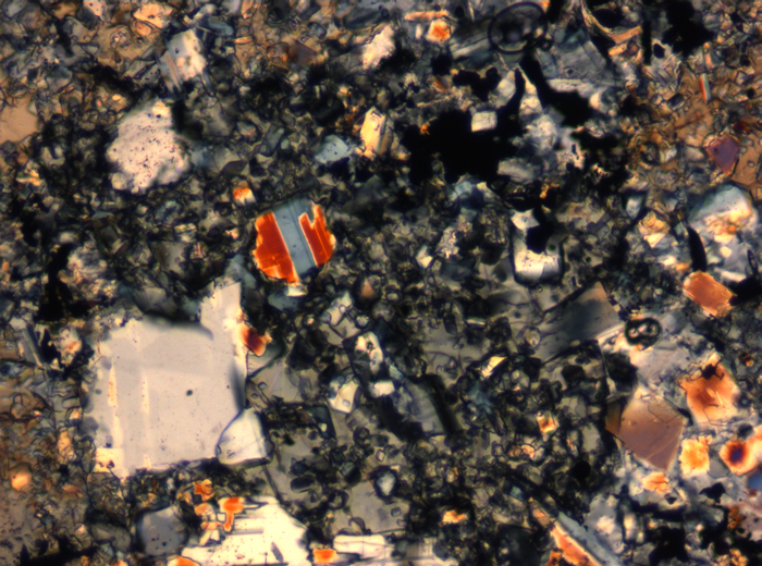 Thin Section Photograph of Apollo 16 Sample 65015,164 in Cross-Polarized Light at 2.5x Magnification and 2.85 mm Field of View (View #19)