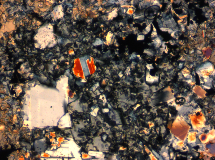Thin Section Photograph of Apollo 16 Sample 65015,164 in Cross-Polarized Light at 2.5x Magnification and 2.85 mm Field of View (View #20)