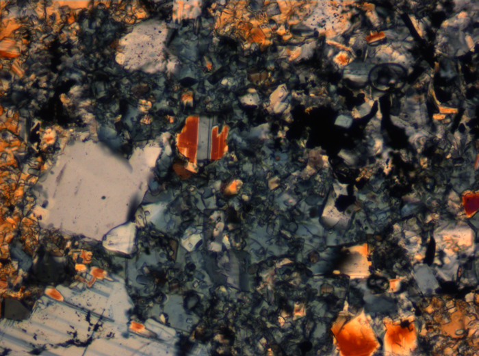 Thin Section Photograph of Apollo 16 Sample 65015,164 in Cross-Polarized Light at 2.5x Magnification and 2.85 mm Field of View (View #24)