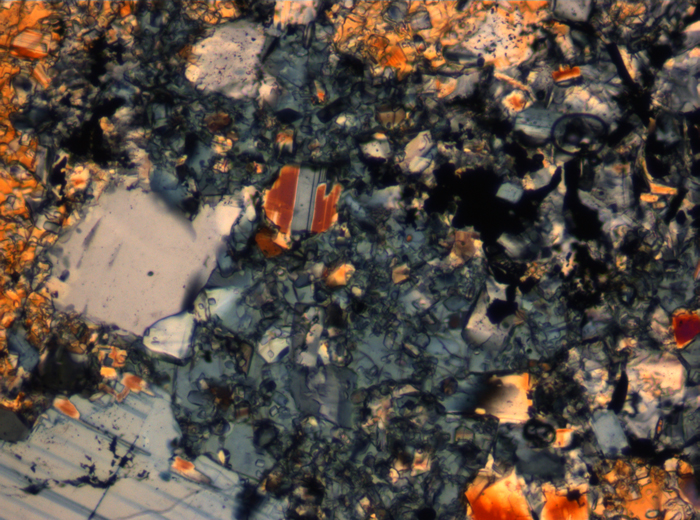 Thin Section Photograph of Apollo 16 Sample 65015,164 in Cross-Polarized Light at 2.5x Magnification and 2.85 mm Field of View (View #25)