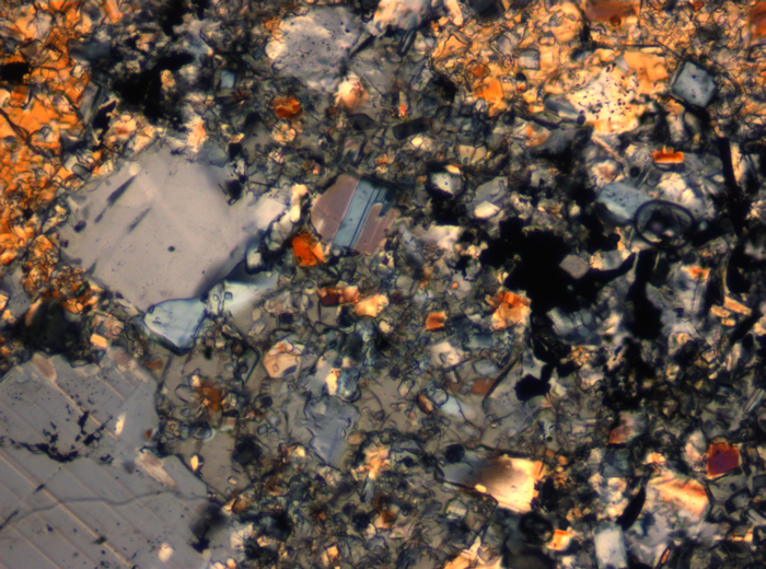 Thin Section Photograph of Apollo 16 Sample 65015,164 in Cross-Polarized Light at 2.5x Magnification and 2.85 mm Field of View (View #28)