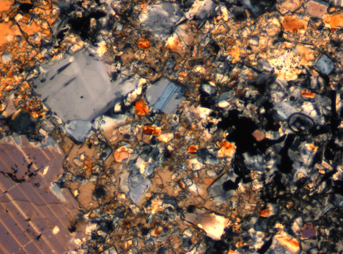 Thin Section Photograph of Apollo 16 Sample 65015,164 in Cross-Polarized Light at 2.5x Magnification and 2.85 mm Field of View (View #30)
