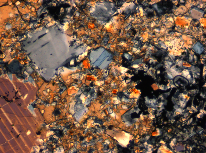 Thin Section Photograph of Apollo 16 Sample 65015,164 in Cross-Polarized Light at 2.5x Magnification and 2.85 mm Field of View (View #31)