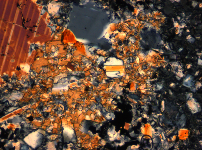 Thin Section Photograph of Apollo 16 Sample 65015,164 in Cross-Polarized Light at 2.5x Magnification and 2.85 mm Field of View (View #41)